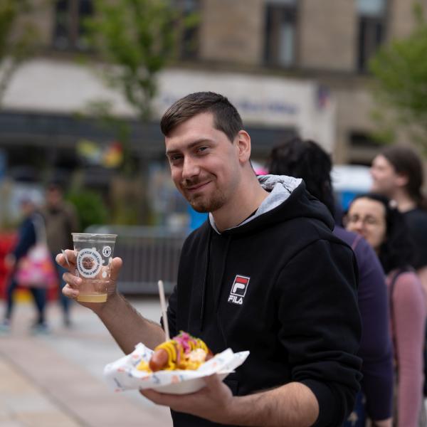 Man with hotdog